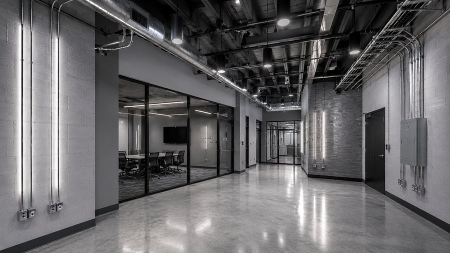 Architect-style visual of a finished commercial tenant improvement interior with coordinated electrical design